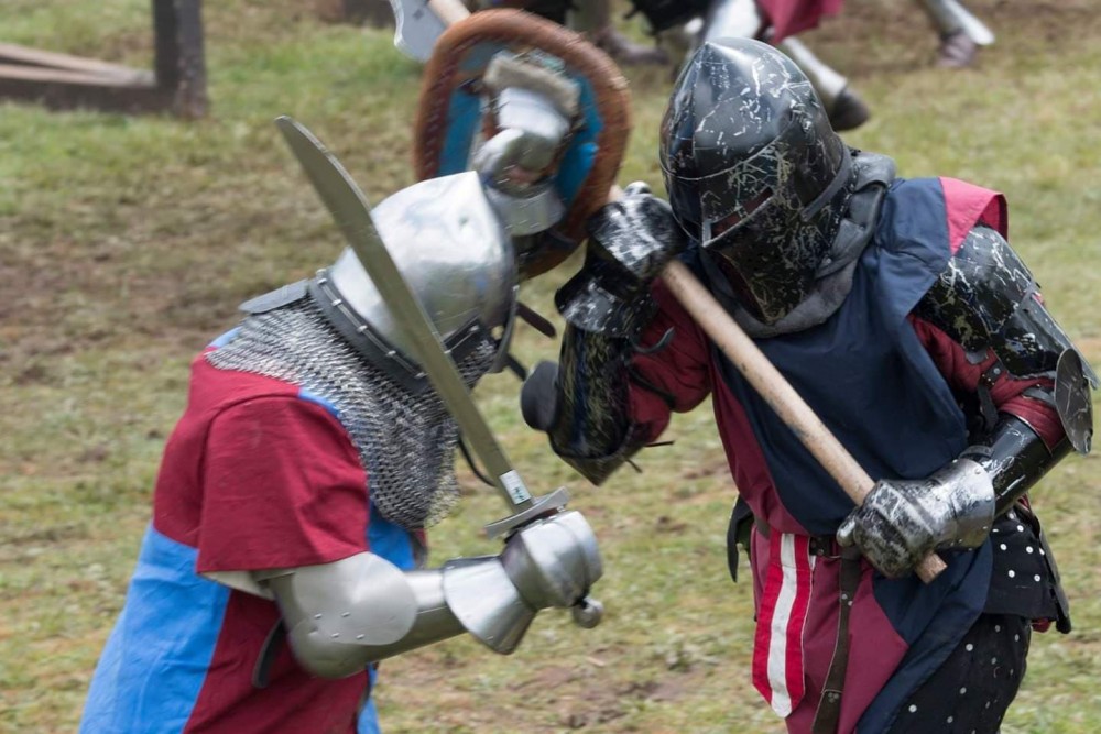 Charging against a falchion-wielding fighter from NSW.