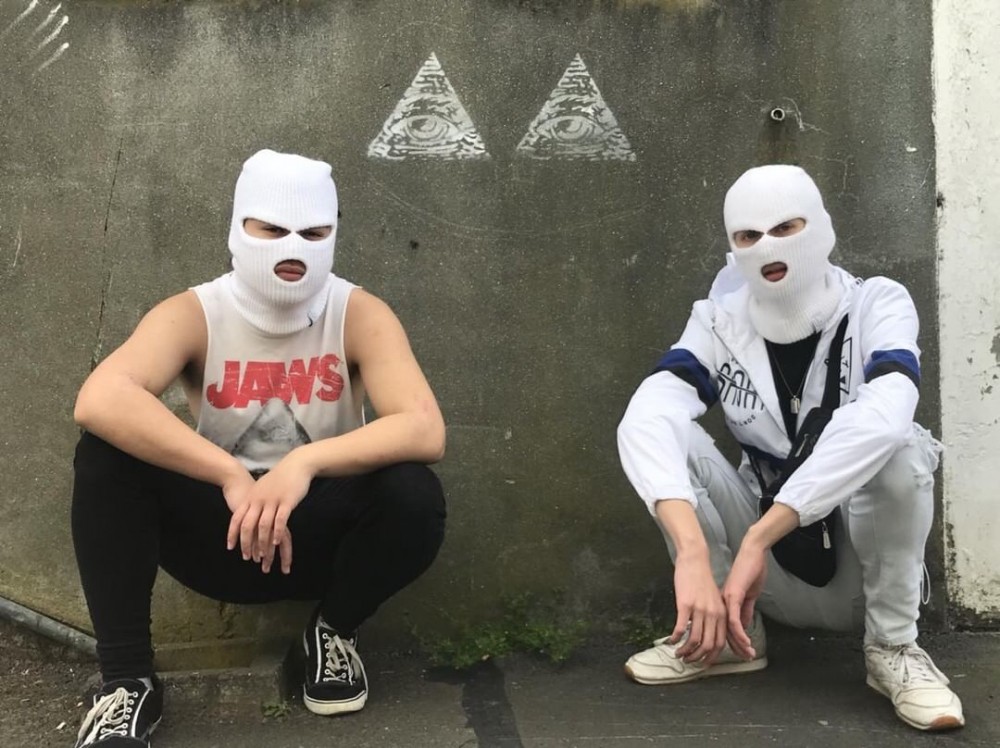 Love this photo because of the Illuminati on the wall and the russian squats